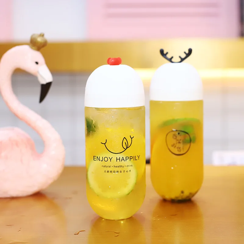 Hot Selling Capsule Shape Beverage Bottle Personalized Antler Stopper Transparent Plastic Bottle Creative Juice Bottle