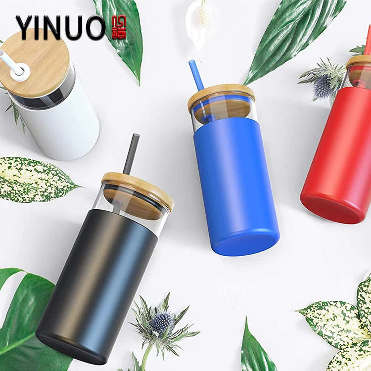 
Glass water tumbler bottle with bamboo lid and silicone sleeve 