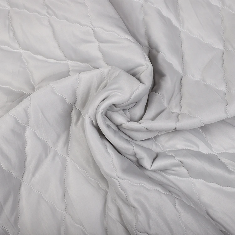 Wholesale China factory manufacturer home woven textile ultrasonic embossed quilting fabric