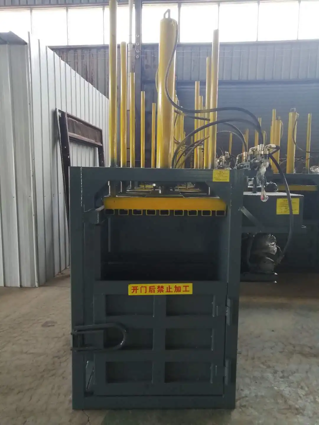 
Vertical hydraulic pressing baler and waste paper baler strapping machine 