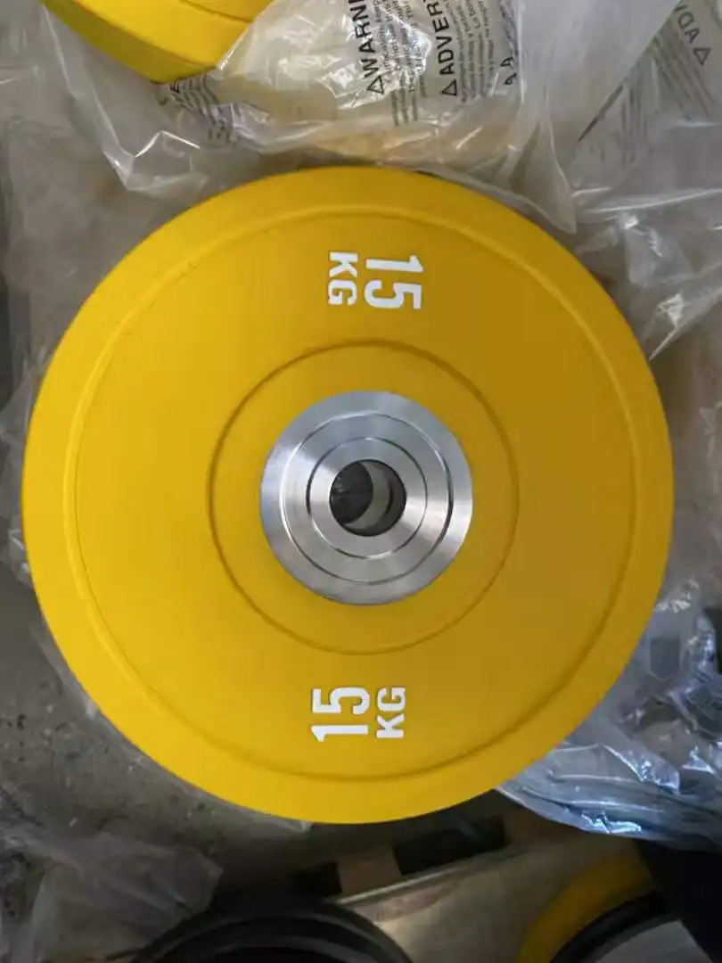 Cheapest price weight lifting barbell 25kg 50 pounds set colorful disc washer competition bumper plate