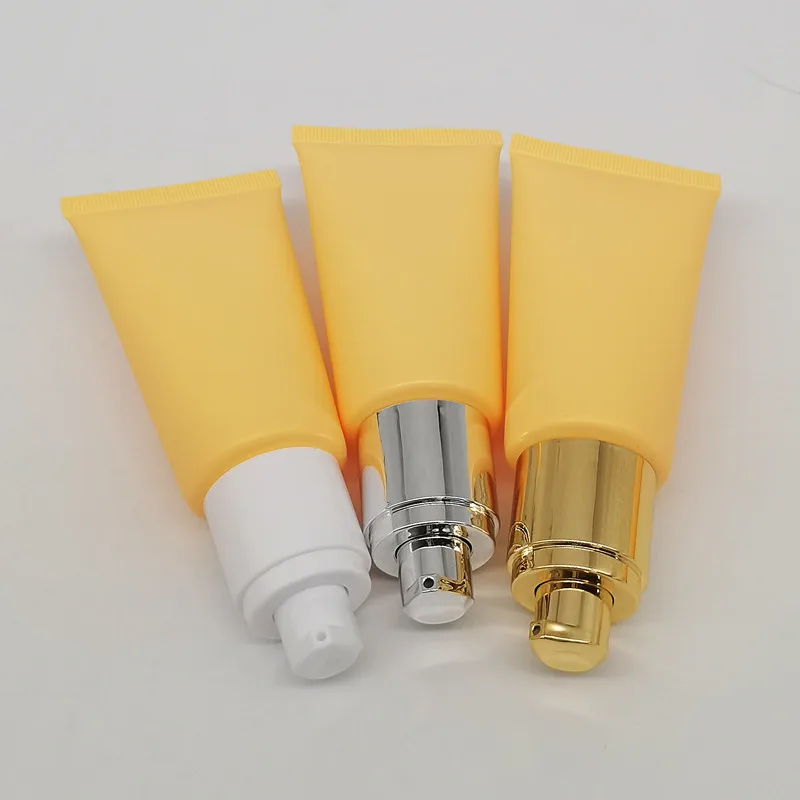 Low MOQ empty plastic 50ml hand cream body lotion soft cosmetic packaging squeeze tube gold silver white pump head