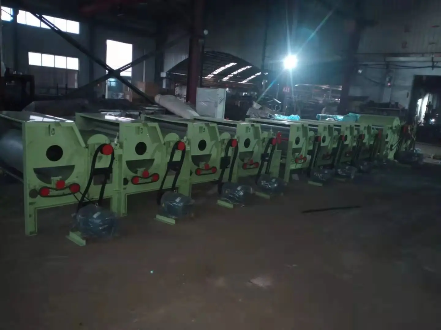 Textile waste old clothes jeans mattress scraps are recycled and opened into fibers textile recycling machine line