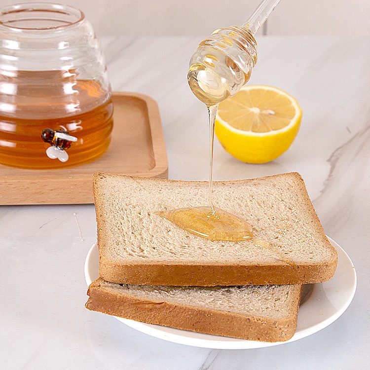 New Top Selling Sellers Kitchen Food Honey Candy Tea Coffee Bar Glass Storage Jar Bottles Jars Container  with Lid Glass Handle