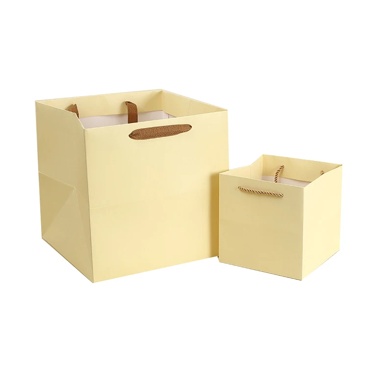 hot selling cheap price square cube paper packaging yellow square base paper bag