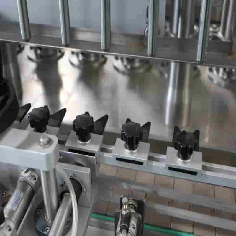 Fully Automatic Edible Cooking  Olive Mustard Coconut Oil Liquid Glass Plastic Bottle Filling Machine With High Accuracy