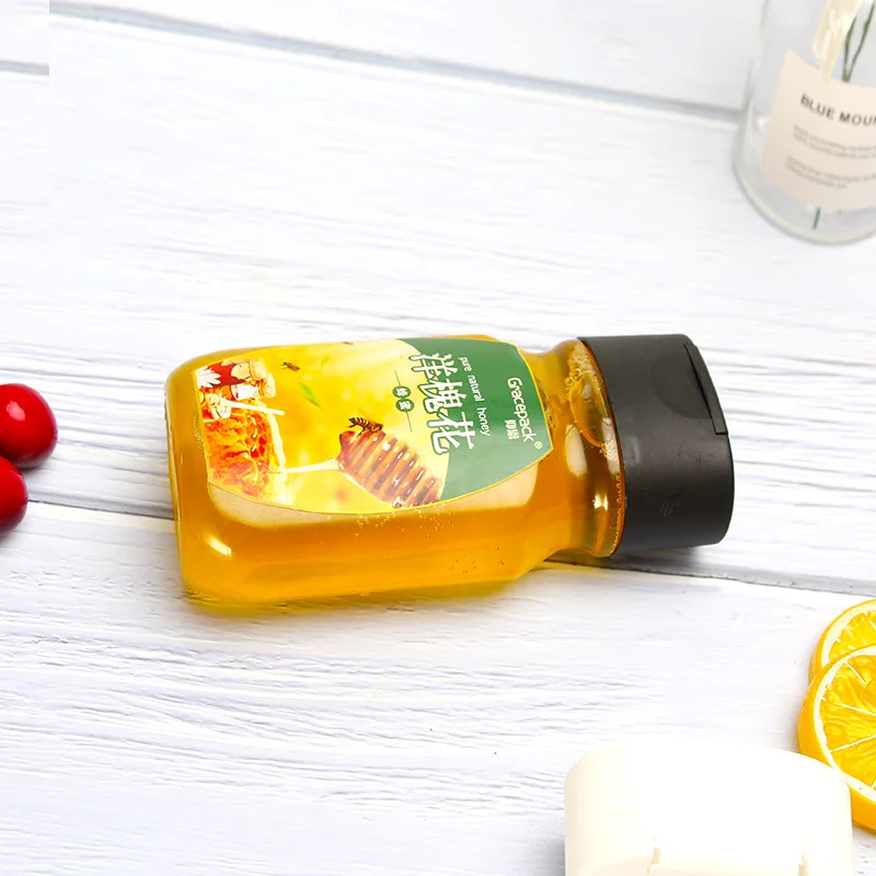 Plastic Honey Bottle with Transparent Lid PET Food Grade Extruded Squeeze Honey Bottle Packaging 290ml
