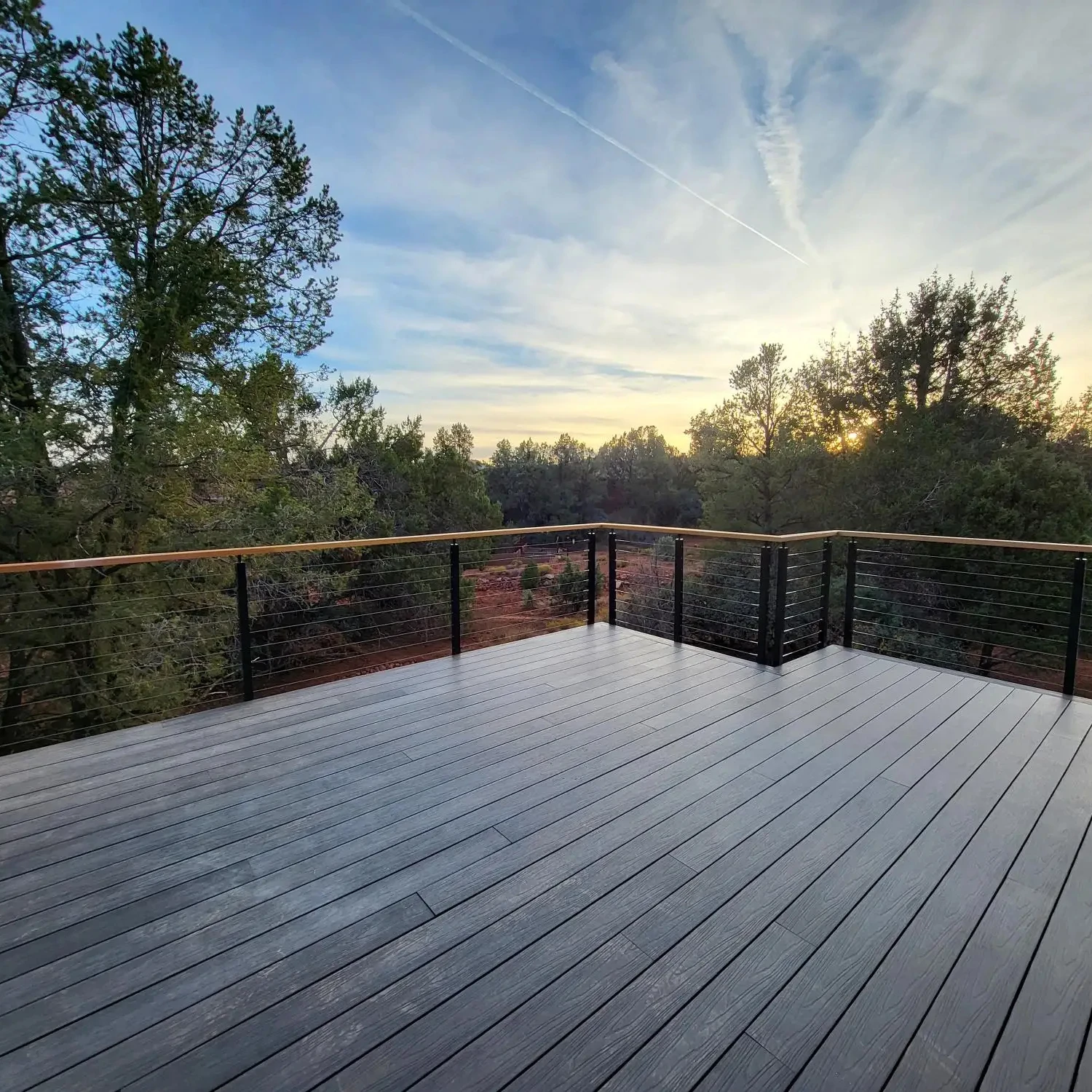 Black aluminum cable railing post with wooden handrail cable railing design
