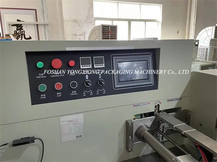 Yongxiong 2022 Automatic Chewy Oat Nut Granola Bars Packaging Machinery Candy Caramel Peanut Bar Packing Machine