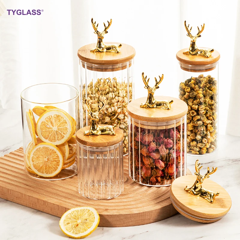Hot sale High borosilicate large glass pumpkin jars custom stripe glass storage jar with an elk bamboo wooden lids for kitchen