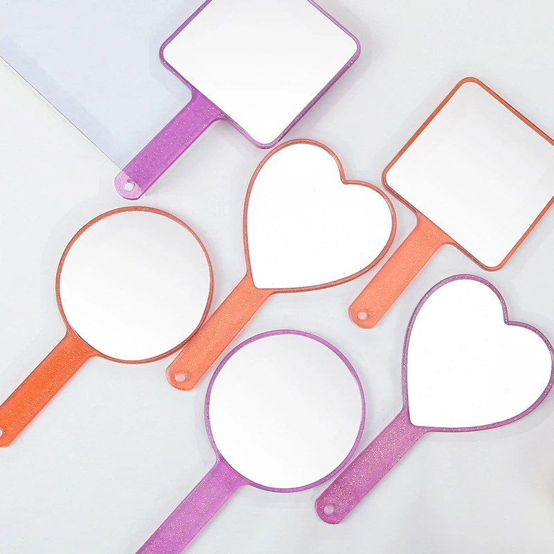 
2021 New Arrival Portable Heart Shape Handheld Makeup Mirror With Custom Logo Glitter Cute Small Pocket Beauty Vanity Mirror 