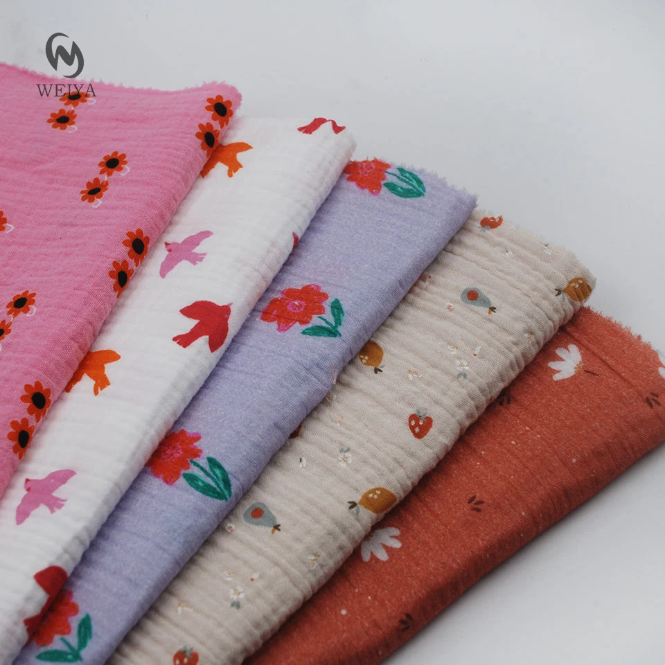 Cute kids wear dress 120gsm custom double gauze crinkle 2 layer 100 cotton printed muslin fabric for baby blanket