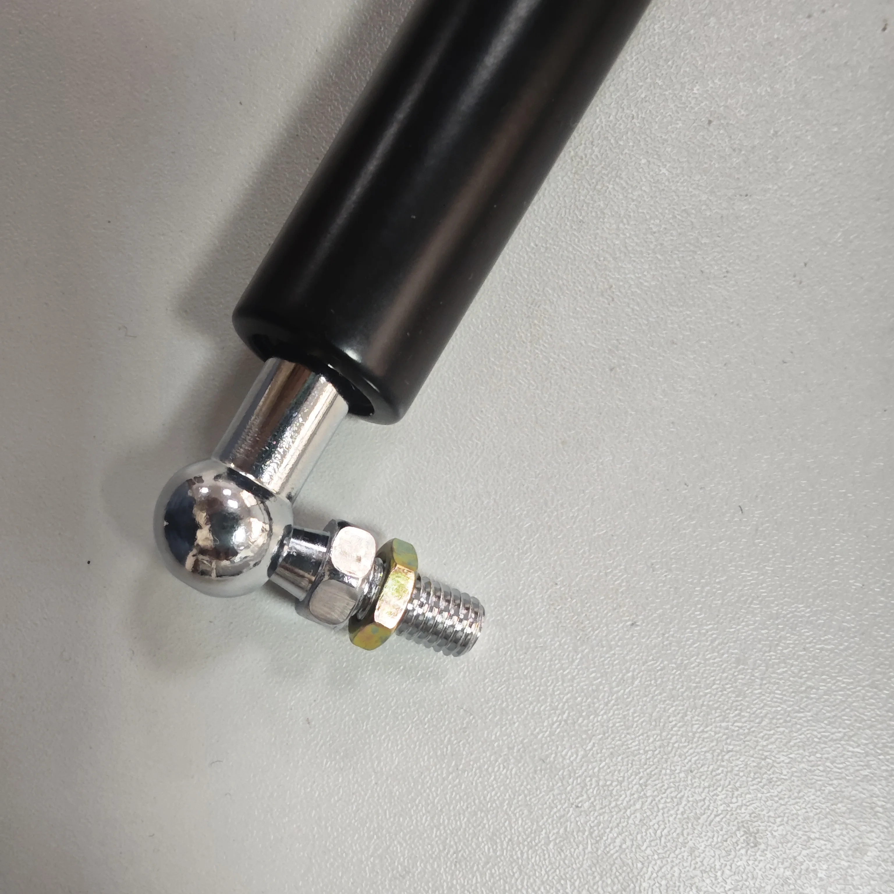 spring-loaded gas spring monitor arm