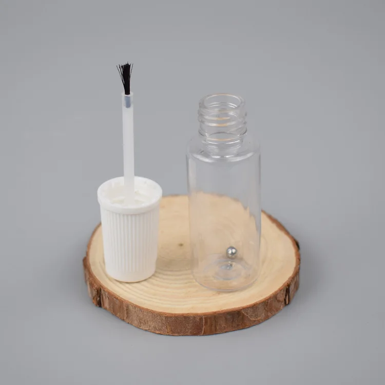 Empty  car repair paint  rpet  bottle with mixing ball and brush