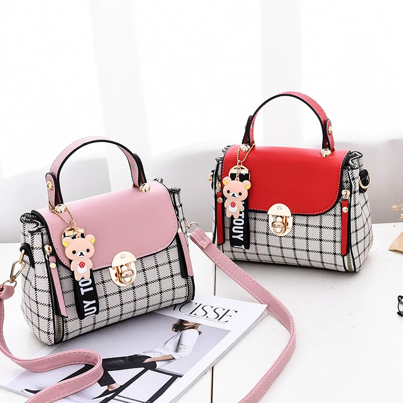 The new Korean version of the beautiful handbag with striped mesengers bag casual shoulder mini bag
