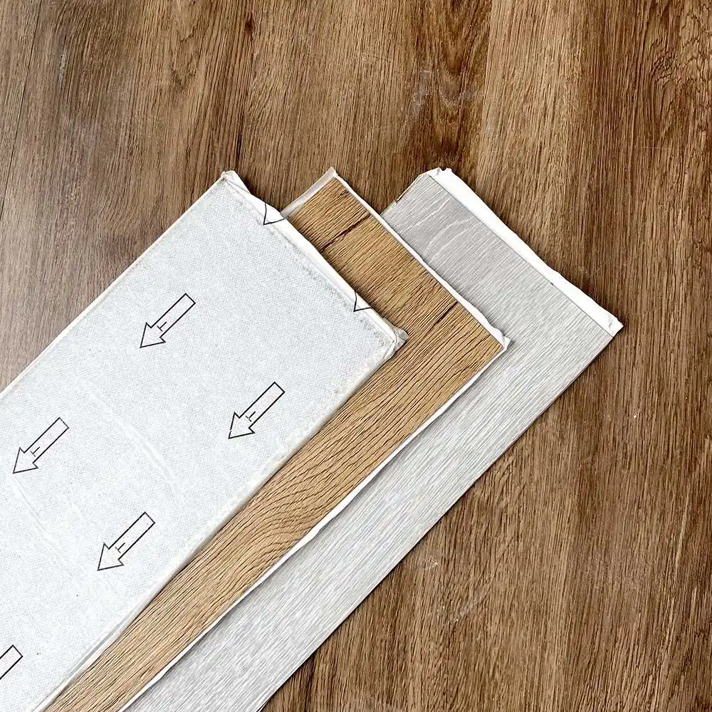 Cheap Wholesale waterproof bathroom floor plastic tiles pvc adhesive vinyl plank floor flexible flooring