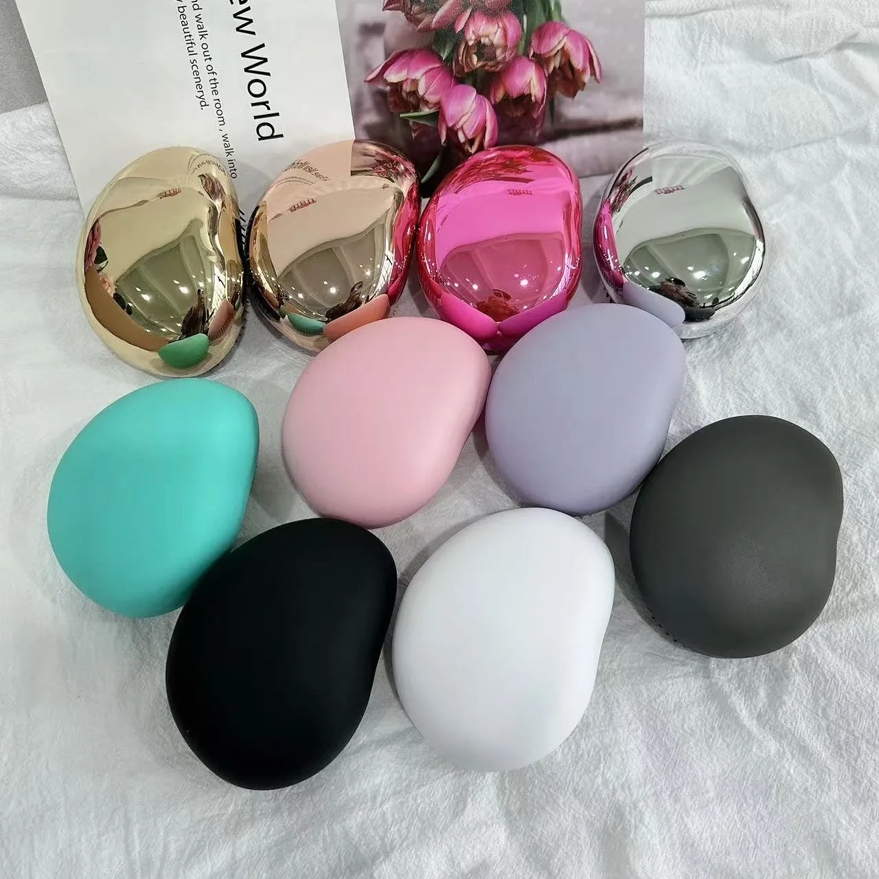 Customized logo hot selling anti-static massage brush travel portable exfoliating egg shaped hair brush