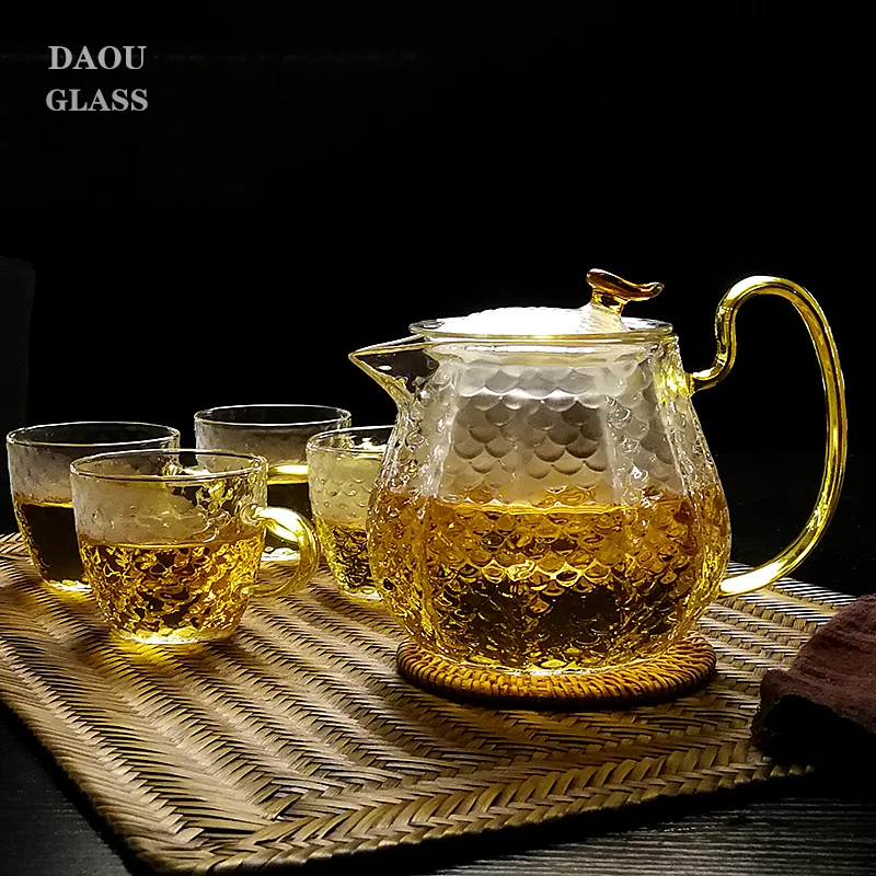 
Handmade clear glass tea sets come with teacups and filters 