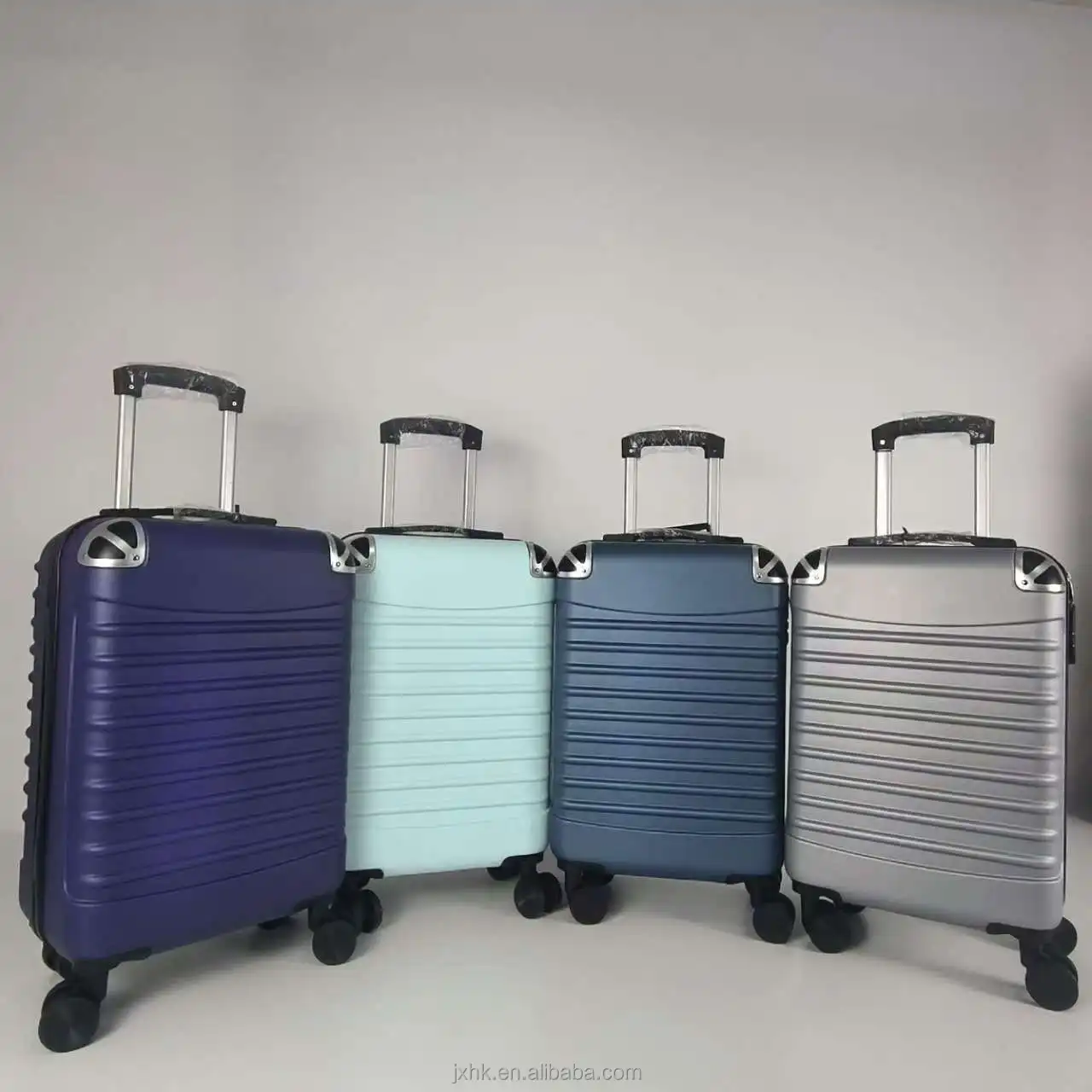 High quality Plastic Shell Durable Suitcase Online Wholesales Luggage Travelling Bags Iron or Aluminum Trolley Bag Spinner Wheel