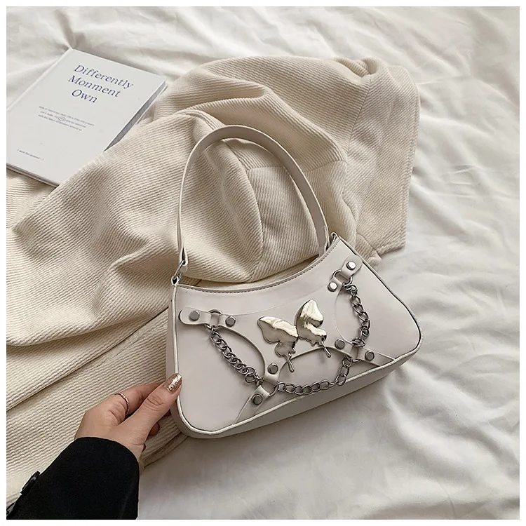 2024 best-selling wholesale mini exquisite bow chain handbag motorcycle street photo women shoulder saddle bag sweet cool style