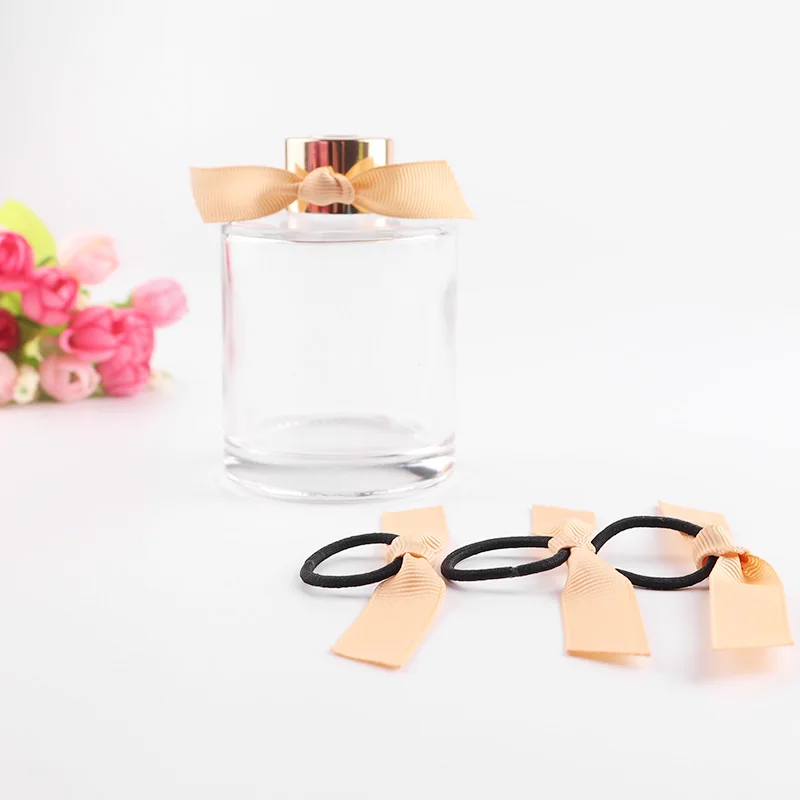 Wholesale gold PRE TIED ribbon bow with elastic ring to support customization