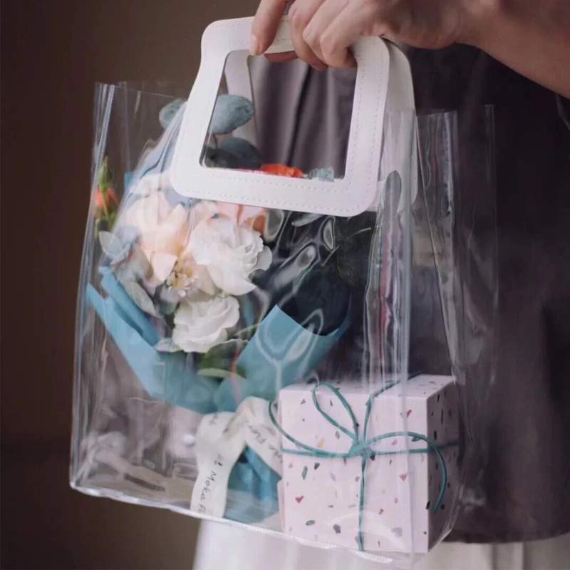 Customized logo Reusable Waterproof PVC Clear Transparent Tote Bag Gift Bag Packaging Shopping Tote Bag  with Leather Handle