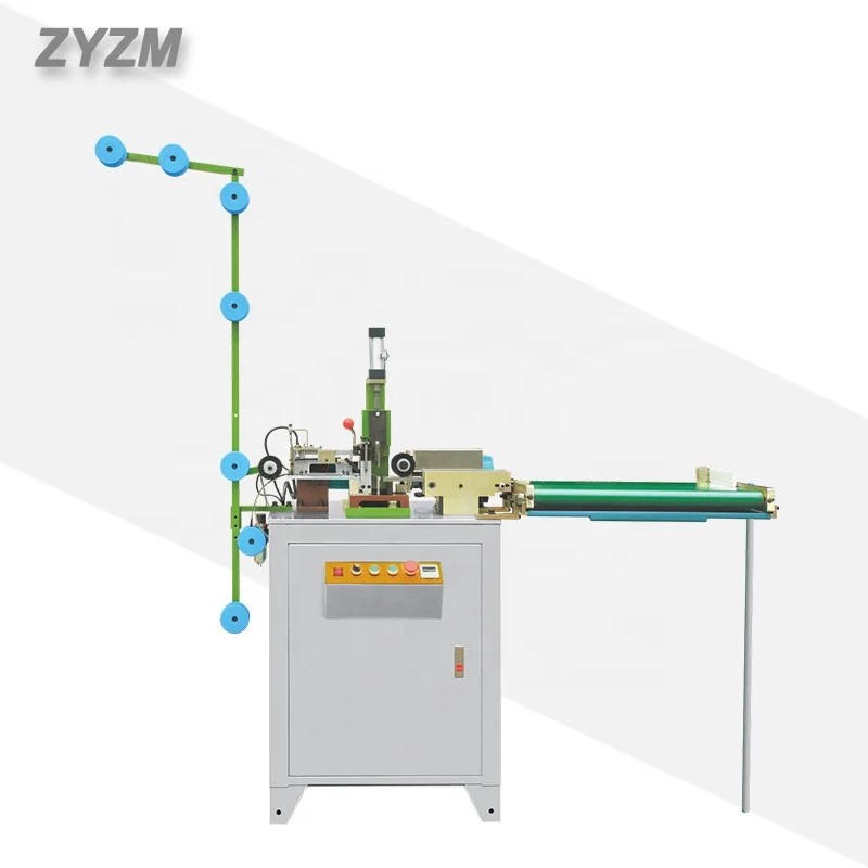 Automatic air-operated zig-zag cutting machine for closed-end zipper