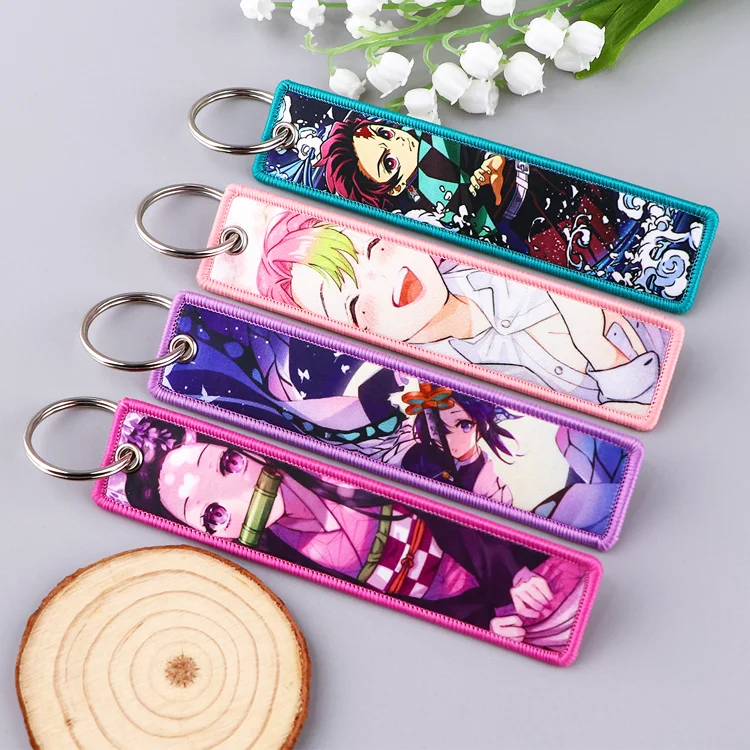 Оптовая продажа брелок с мультяшным реактивным ярлыком на заказ тканевый вышивкой в виде демонов