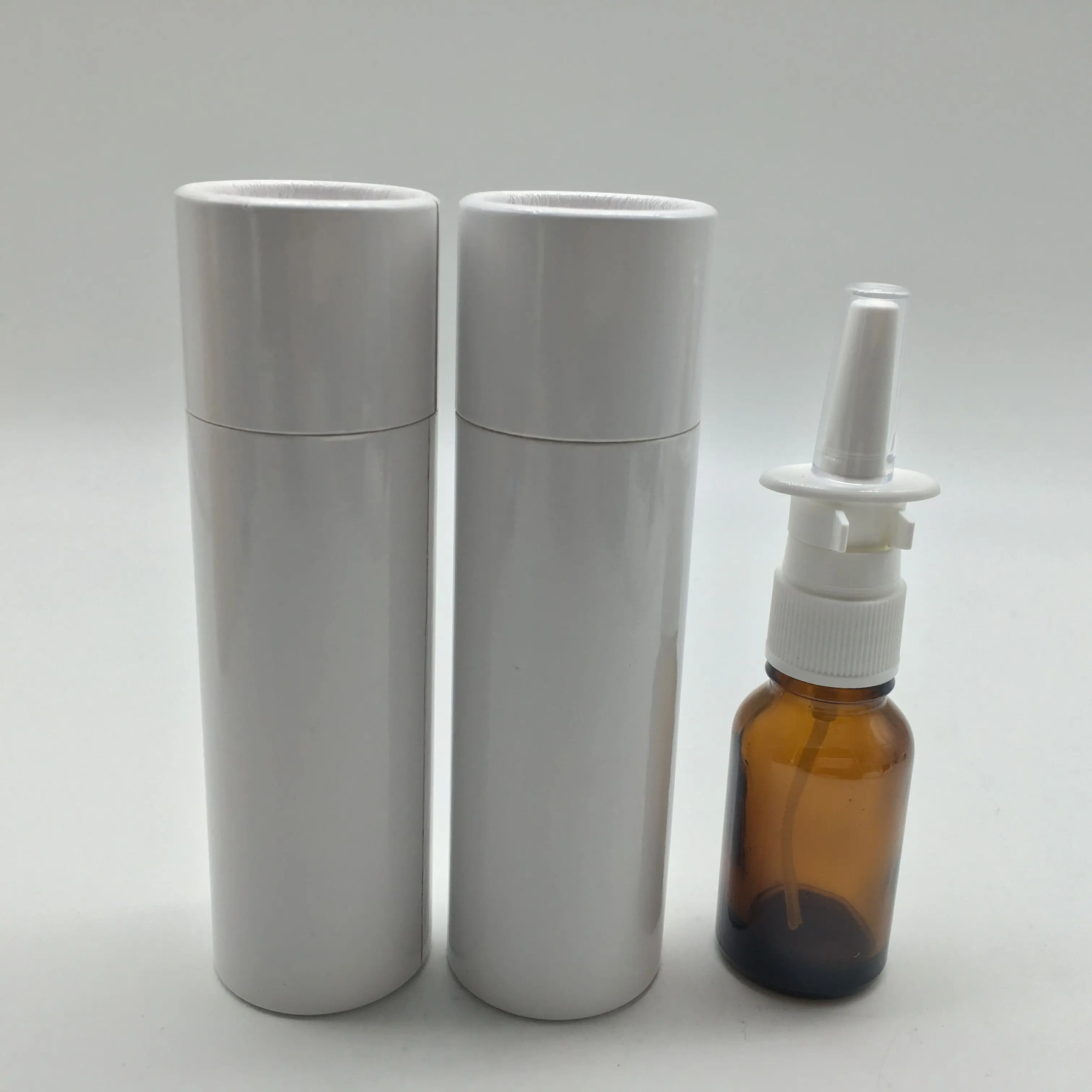 wholesale white Cosmetic Round Recycled Cardboard Paper Perfume Gift Box tube for cosmetic amber bottle with nasal sprayer