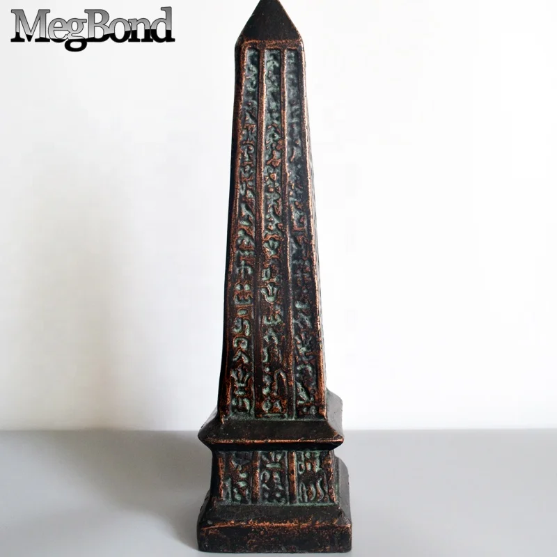 Antique bronze cast iron Egyptian traditional obelisk in metal material