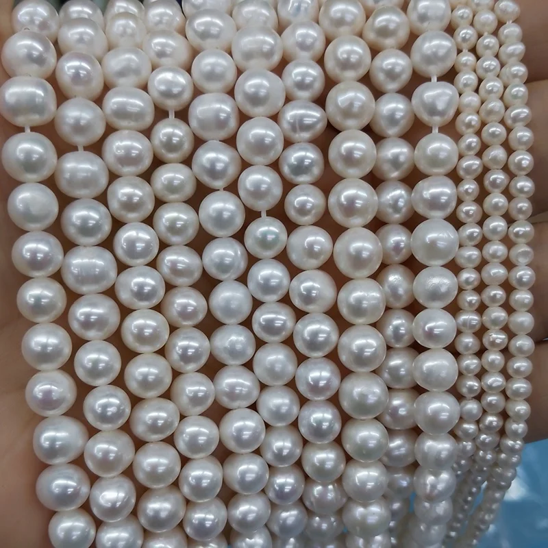 Wholesale natural cultured freshwater white/pink/purple oval round potato pearls in all sizes for elegant jewelry making