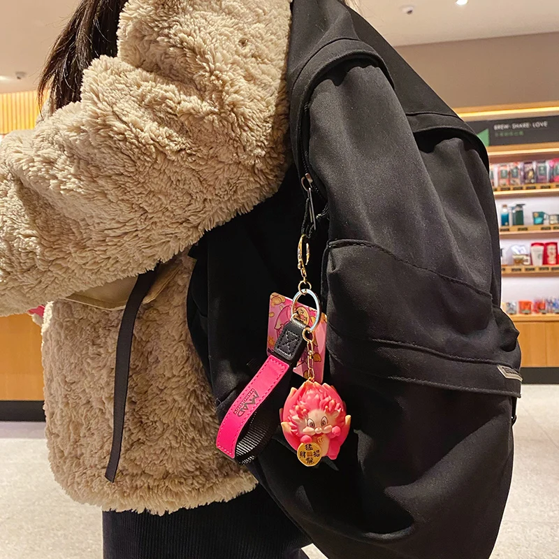 Baimao High quality wholesale New Year cartoon pitaya key chain creative dragon baby resin key chain New Year gift