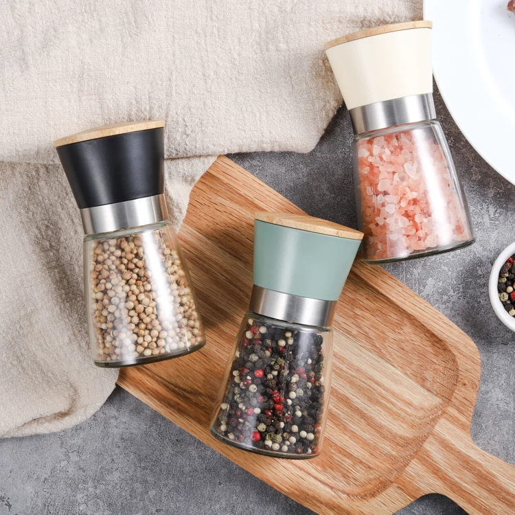 
LFGB PP plastic body stainless steel ring Ceramic burr manual Salt and pepper mill with wooden Lid 170 mL glass bottle 