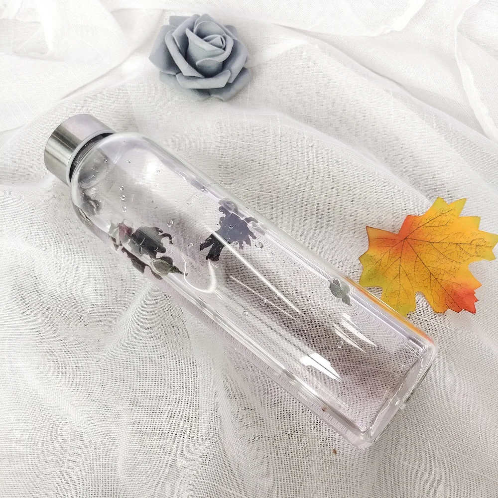 High Borosilicate Custom Logo Clear Glass drinking Bottle Luxury Style Smooth Glass Water Bottle With Sealing lid