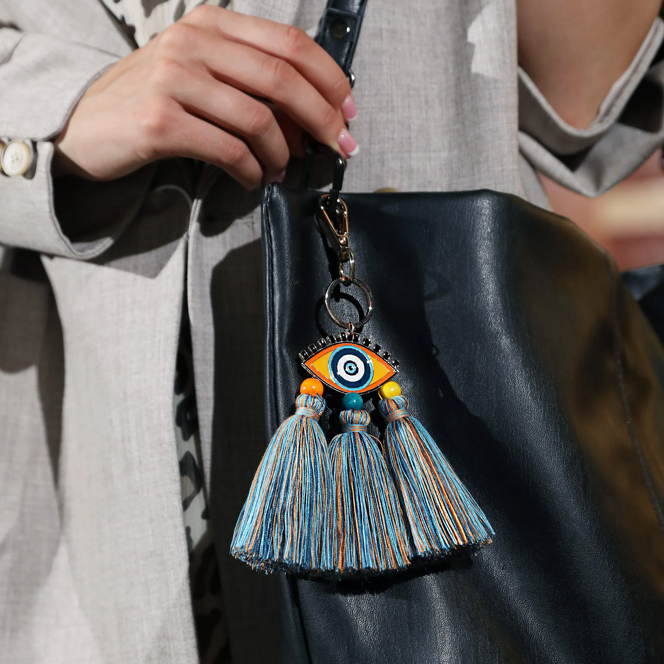  New design fashion personalized enamel devil eye 100% cotton tassel macrame keychain bag charm for