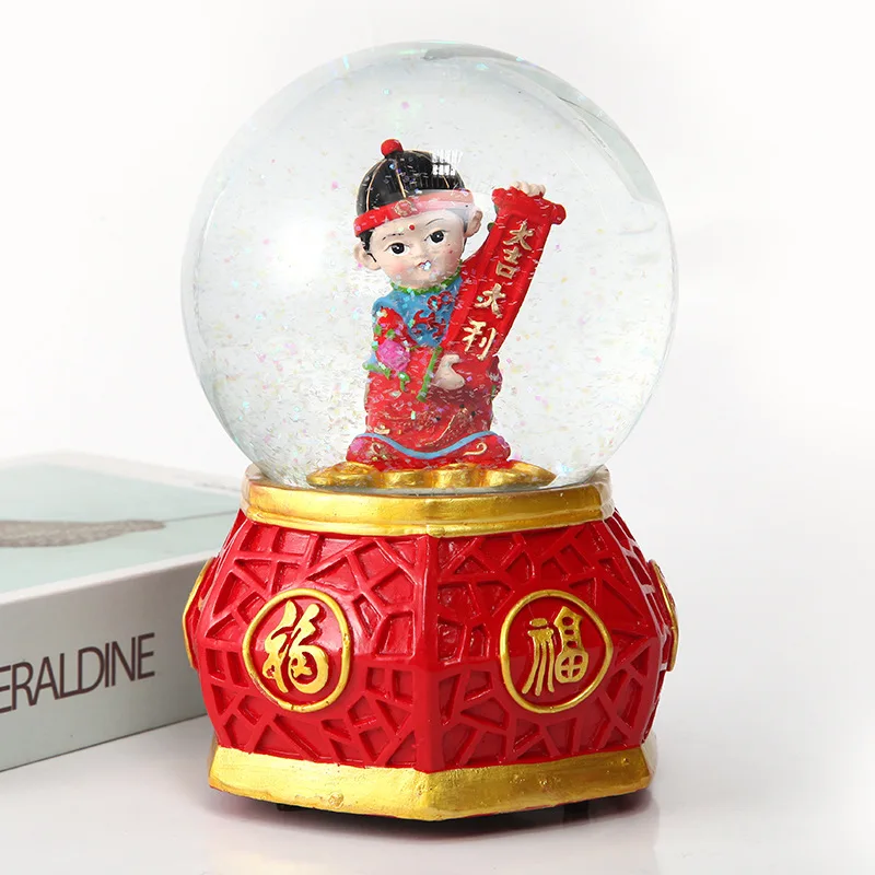 Chinese Traditional God of Wealth Golden Boys Jade Maidens Crystal Glass Snow Globe with LED Light and Music for New Year Gifts