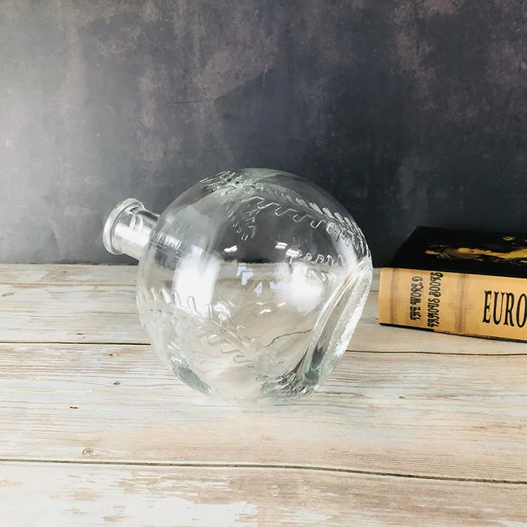 Ball Shape Whisky 750ml Custom Embossed Clear Glass Liquor Bottle