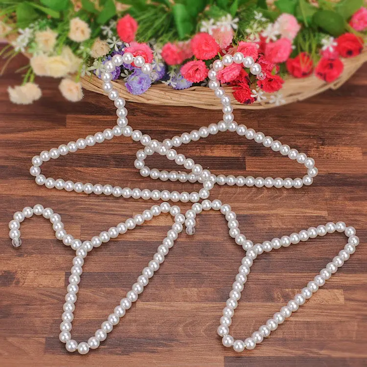 Plastic Abs Wholesale Mini white Clothes Hanger Cute Cat Hutch Dog Cloth Hanger Perchas Pearl pet Hanger For Clothes