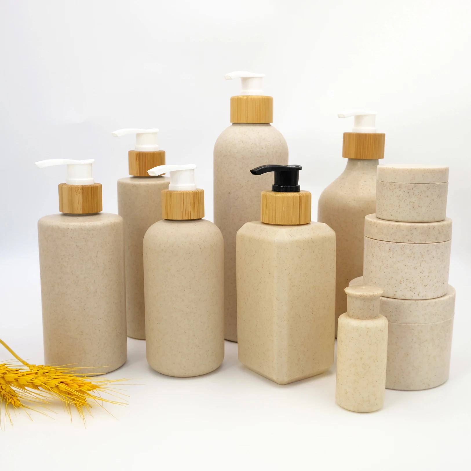 ECO Biodegradable 50ml 100ml 150ml 250ml 300ml 350ml 500ml HDPE Wheat Straw Lotion Empty Bottle with Bamboo Pump