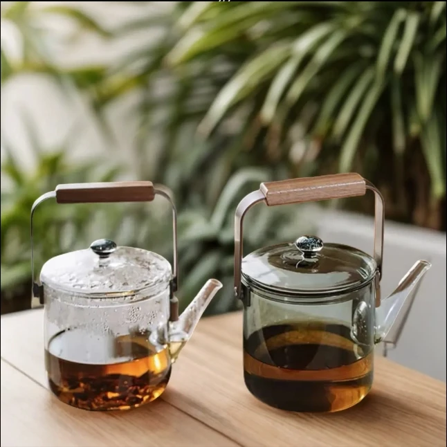2024 high borosilicate hydrochloric acid glass tea and coffee pot lid and handle design is simple and generous