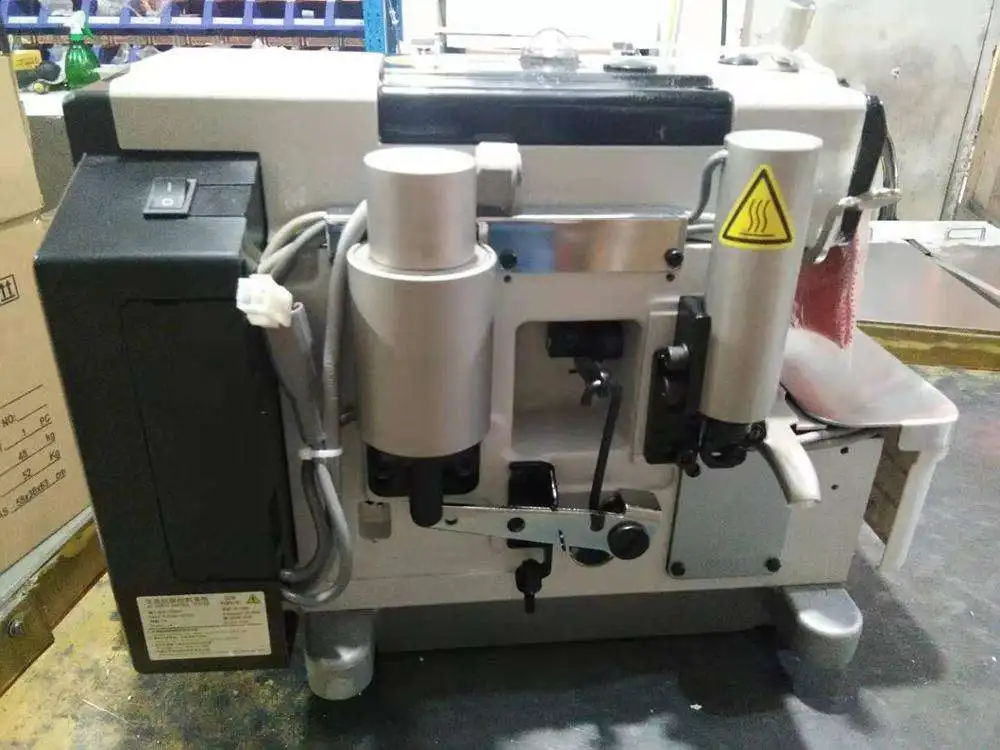 ST 988-4D-EXT Mechatronics Full Automatic Computerized Overlock Sewing Machine