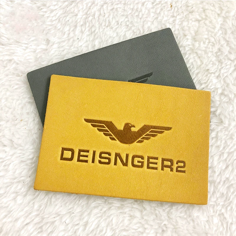 Fashion Logo Free Sample New Design Low Price Custom Rounded Leather Keychain Patch Logo Snapback Wholesale Pu Patch