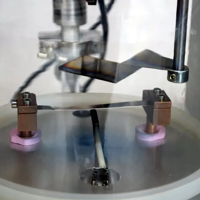 Ceramic tungsten heater for high vacuum thermal evaporation coater