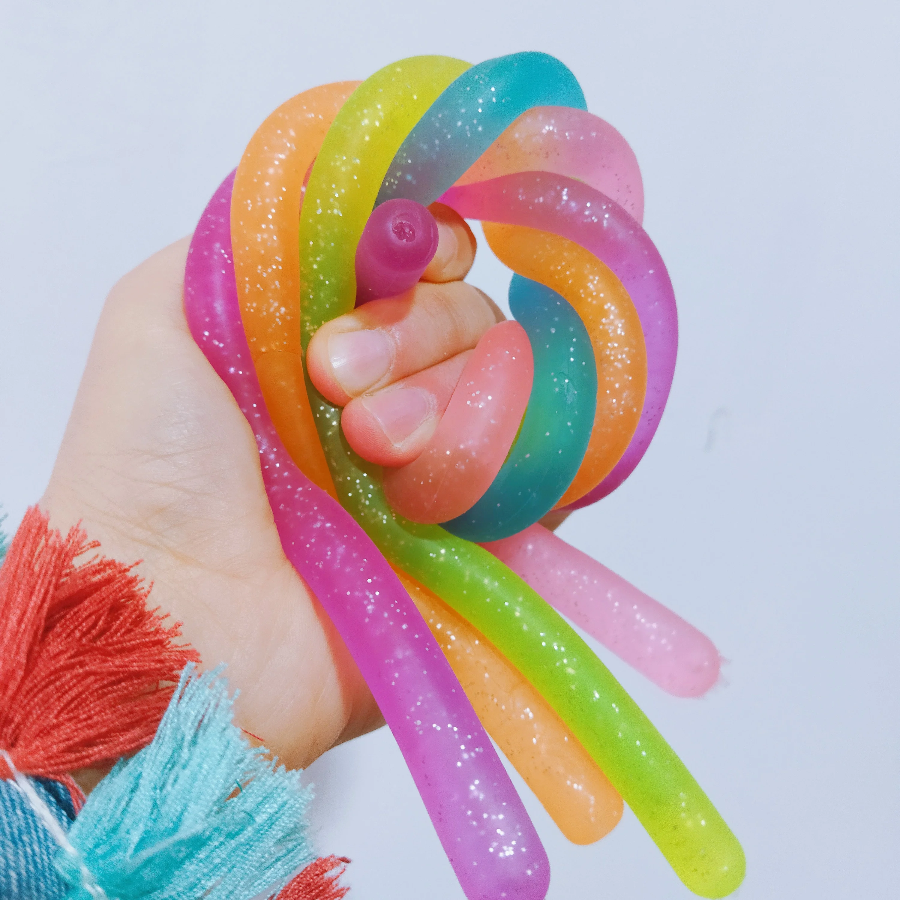 
Colorful TPR Elastic 27cm glitter Anti Stress Toy tie dye monkey noodles stretchy string For Kids 