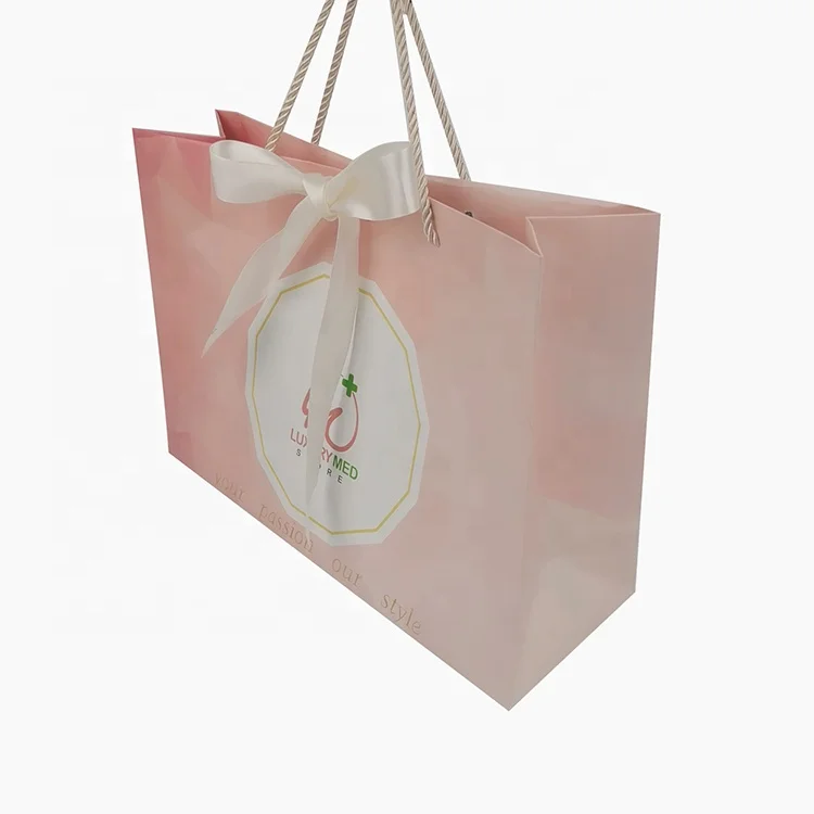 wholesale luxury pink cardboard wedding gift paper bags with handle gold ribbon