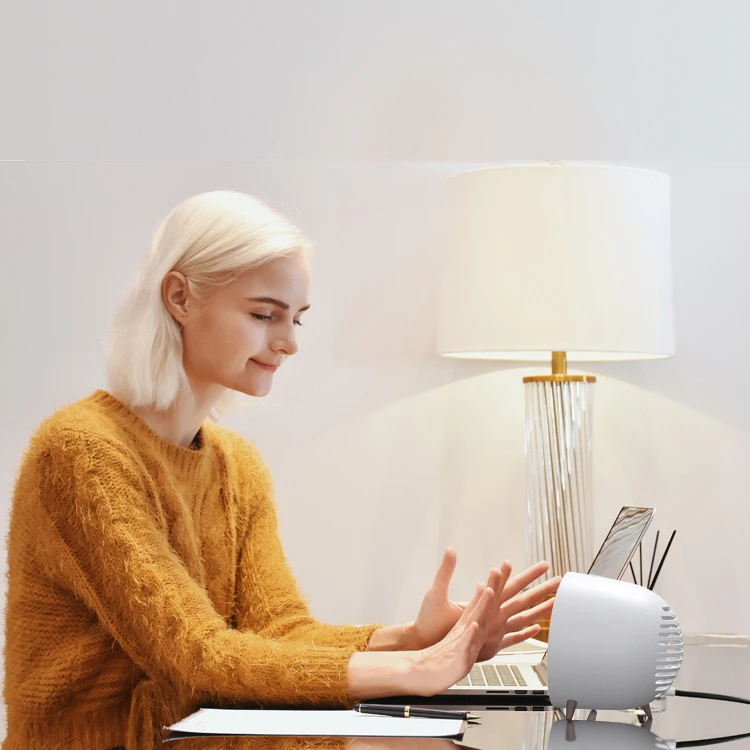 2022 YUHUA New Arrival Multifunction Fast Heating Quiet USB Mini Fan Heater