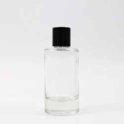 2022 Hot sale Luxury 100ml Transparent Oblate Shape Glass Mist Spray Perfume Bottle Luxury Glass With Gold Pump