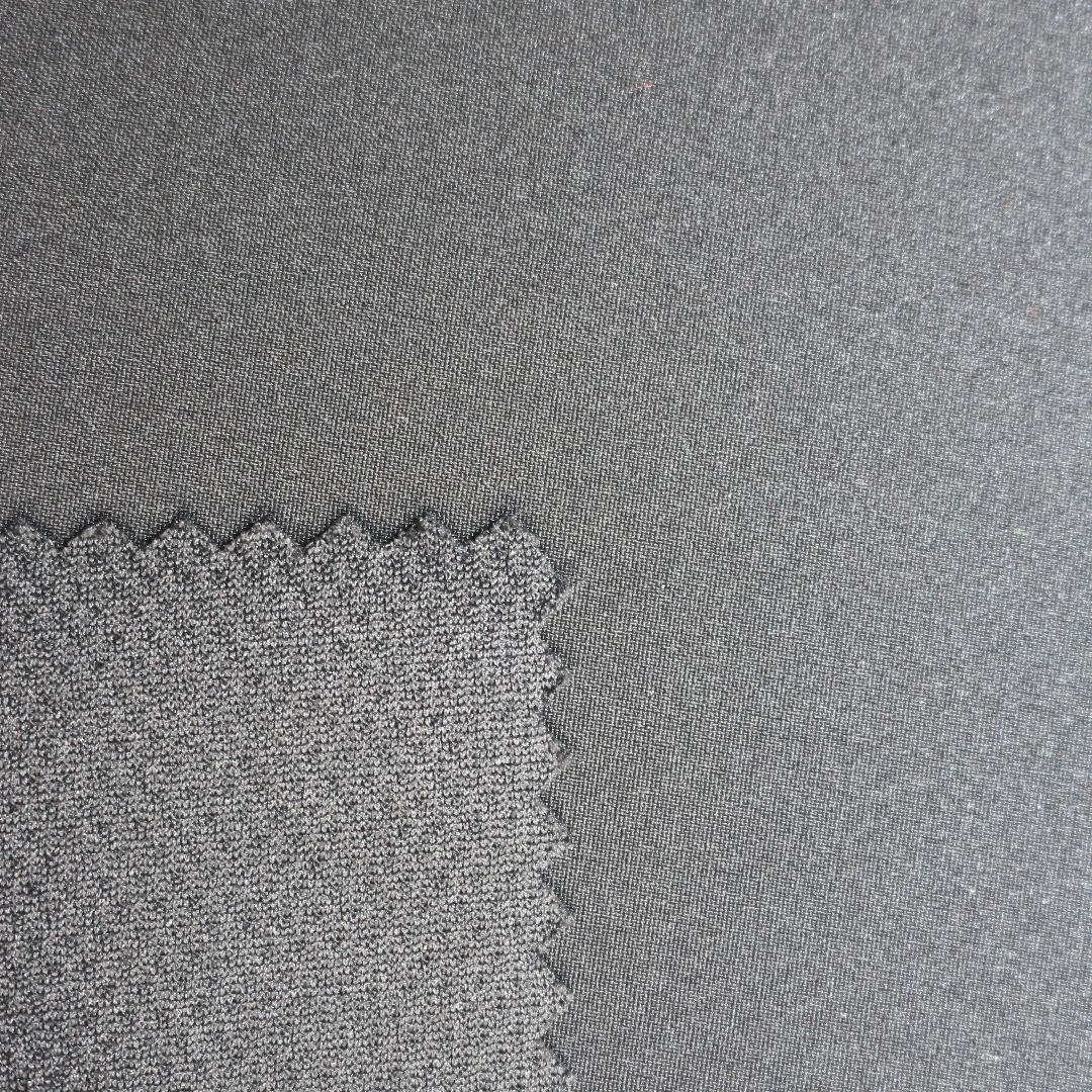 PS1/ROON8-4 60C REC 100D Recycle Poly Spandex bonded with Poly 75D bird eyes dobby fabric for jacket