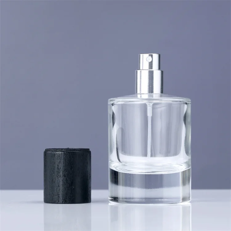 cheap magnetic lids 30ml 33ml 35ml cylinder glass perfume packaging bottle high gloss black with magnet cap india