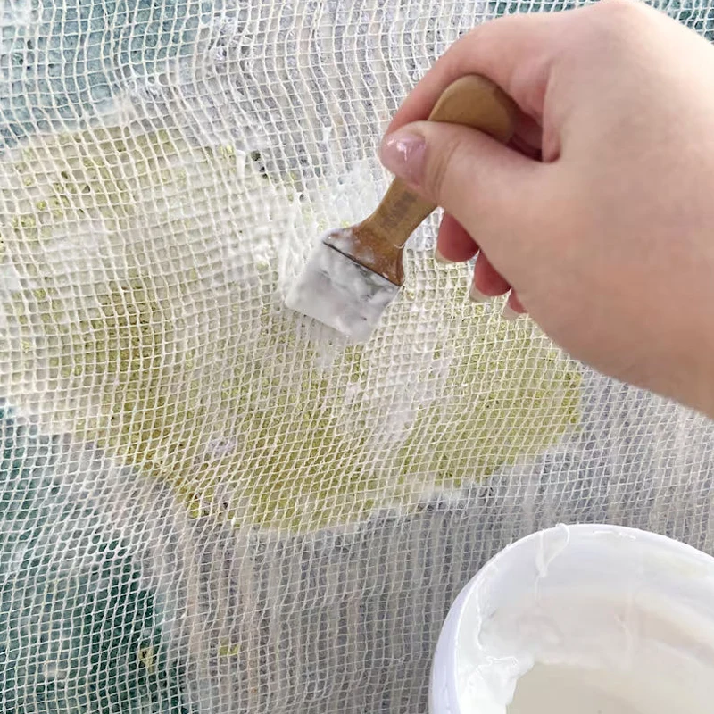 Environmentally friendly durable secondary mesh backing fabric for tufting carpet